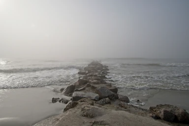 A foggy morning on Folly Island beach in South Carolina