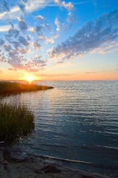 The sun setting over the sound on Hatteras island